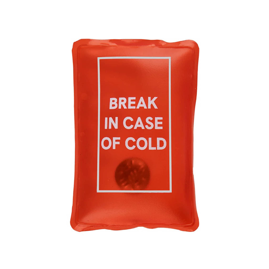 Red reusable hand warmer pack with with 'Break in case of cold' text, on a white background.