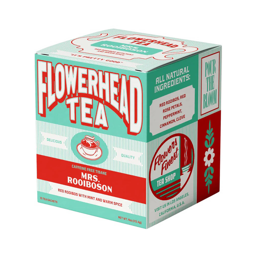 Flowerhead Tea Mrs. Rooiboson  caffeine free tisane tea blend tea bags in mint green and red box packaging, front angle.