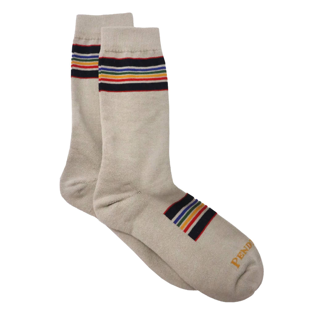 Pair of light taupe socks with colorful stripes on a white background.