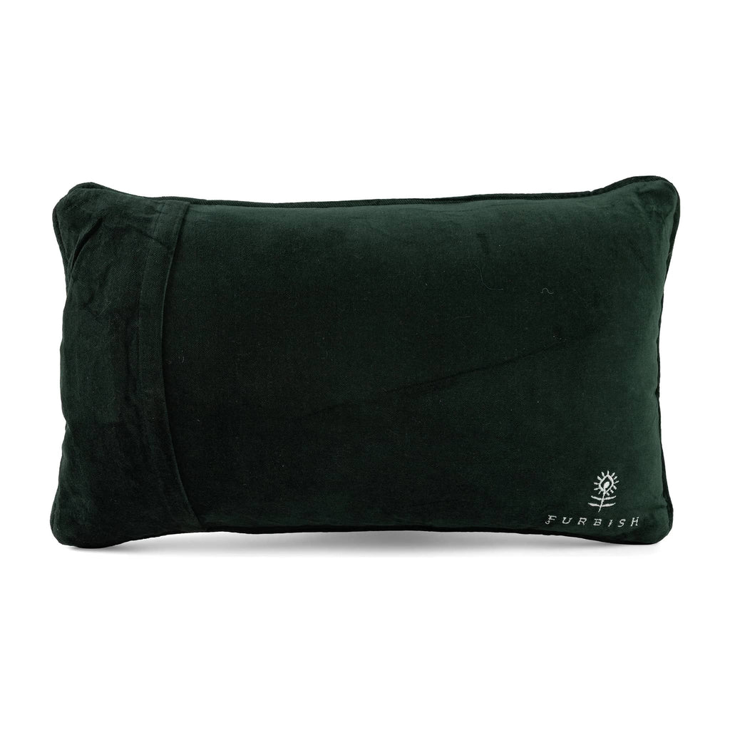 Dark green velvet backing on a pillow with 'Furbish' branding on a white background.