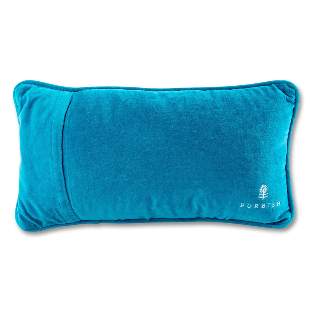 Furbish studio needlepoint pillow, back of pillow covered with teal velvet fabric.