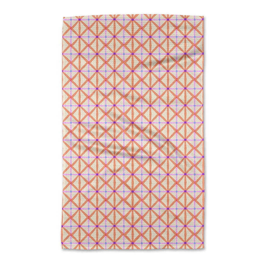 Geometry Anew eco-friendly kitchen tea towel with orange and purple geometric print.