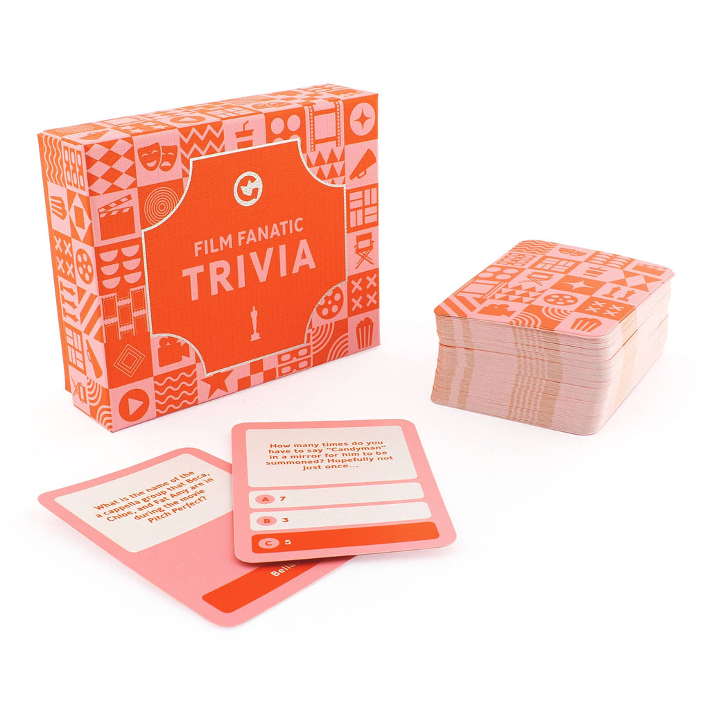 Ginger Fox Film Fanatic Trivia in orange and pink illustrated game box with sample cards.