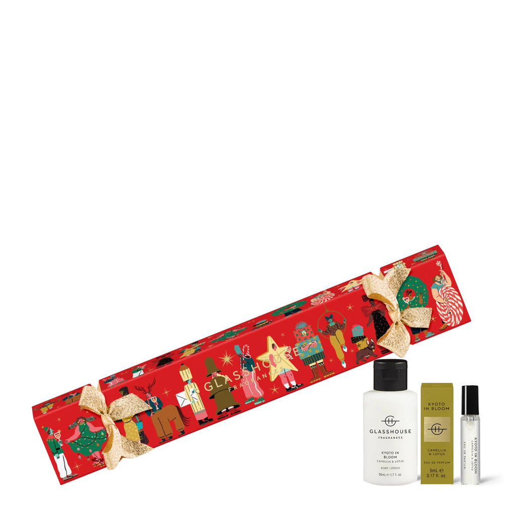Glasshouse Fragrances Kyoto in Bloom scented mini body lotion and eau de parfum in a limited edition holiday christmas bon bon cracker, front view.