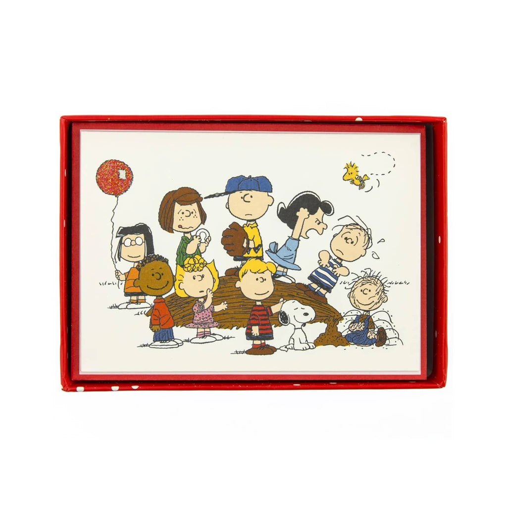 Greeting cards with Peanuts characters around and on a pitching mound in a red box, on a white background.