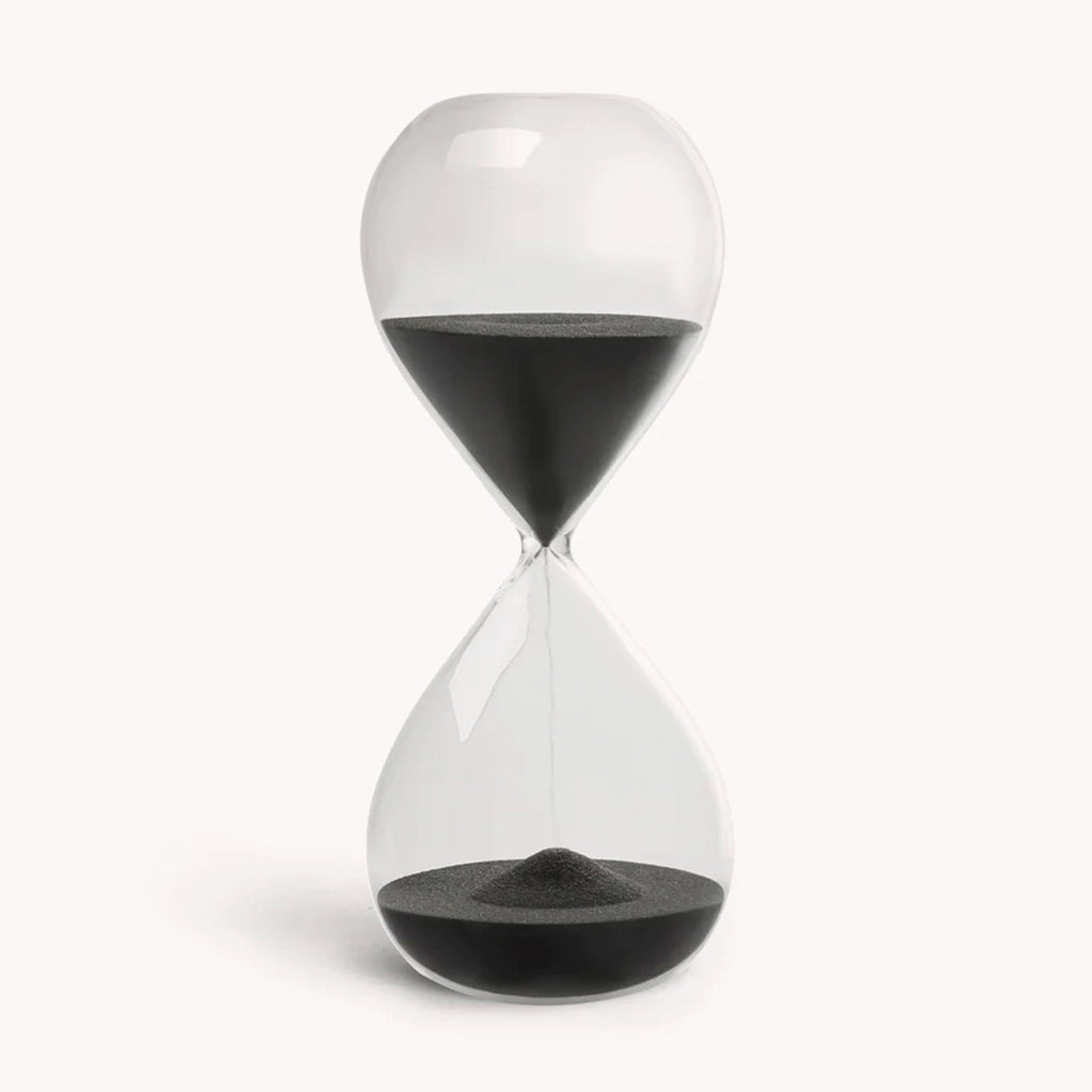 Gry Mattr 30 minute clear glass desktop hourglass with jet black sand.