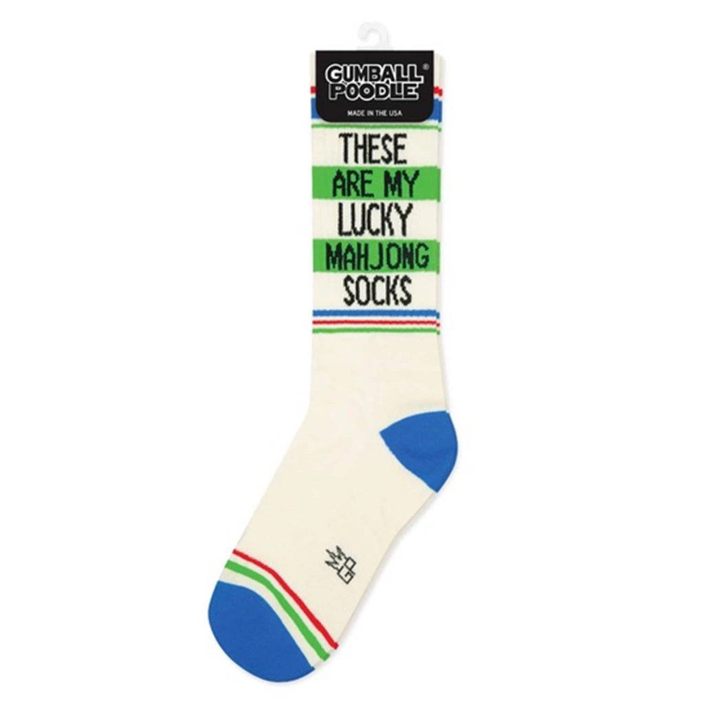Socks with text 'These are my lucky mahjong socks' and Gumball Poodle branding, on a white background.