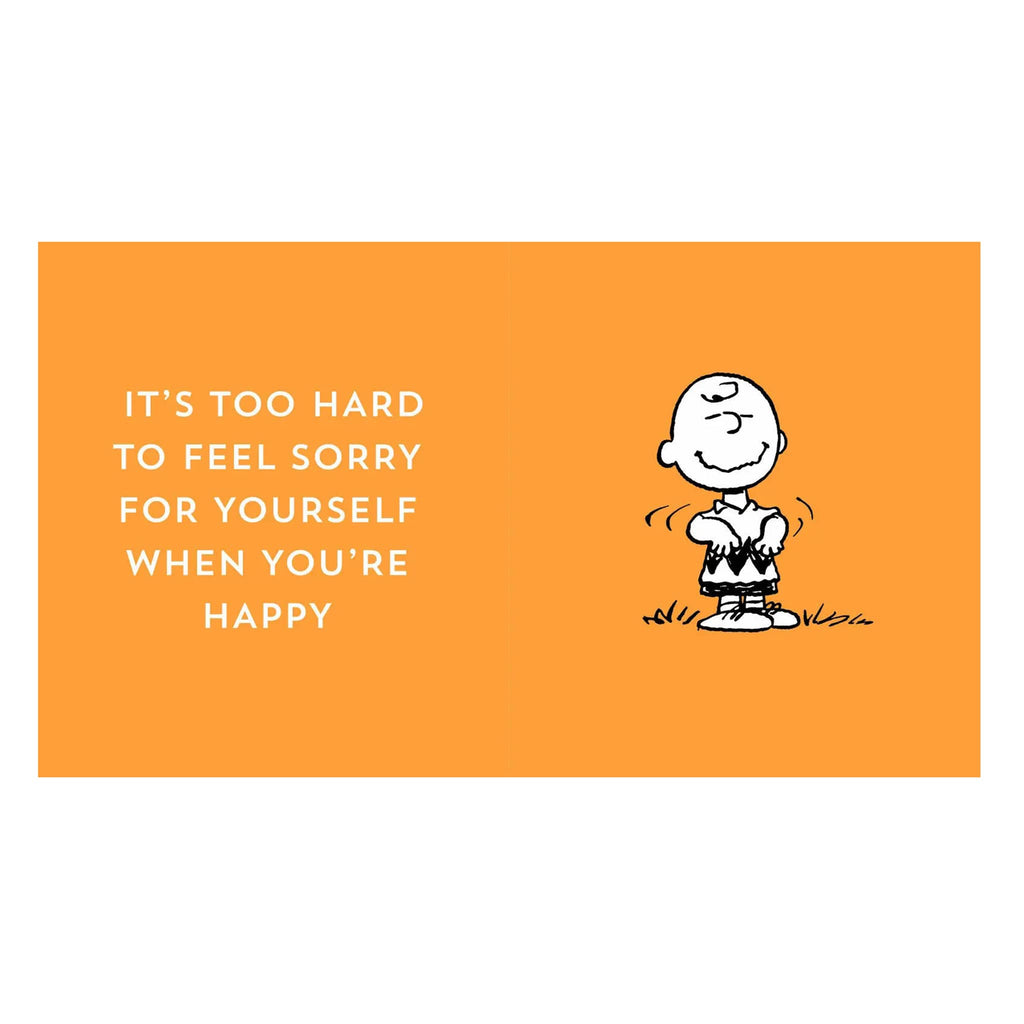Charlie Brown on an orange background with a motivational quote.