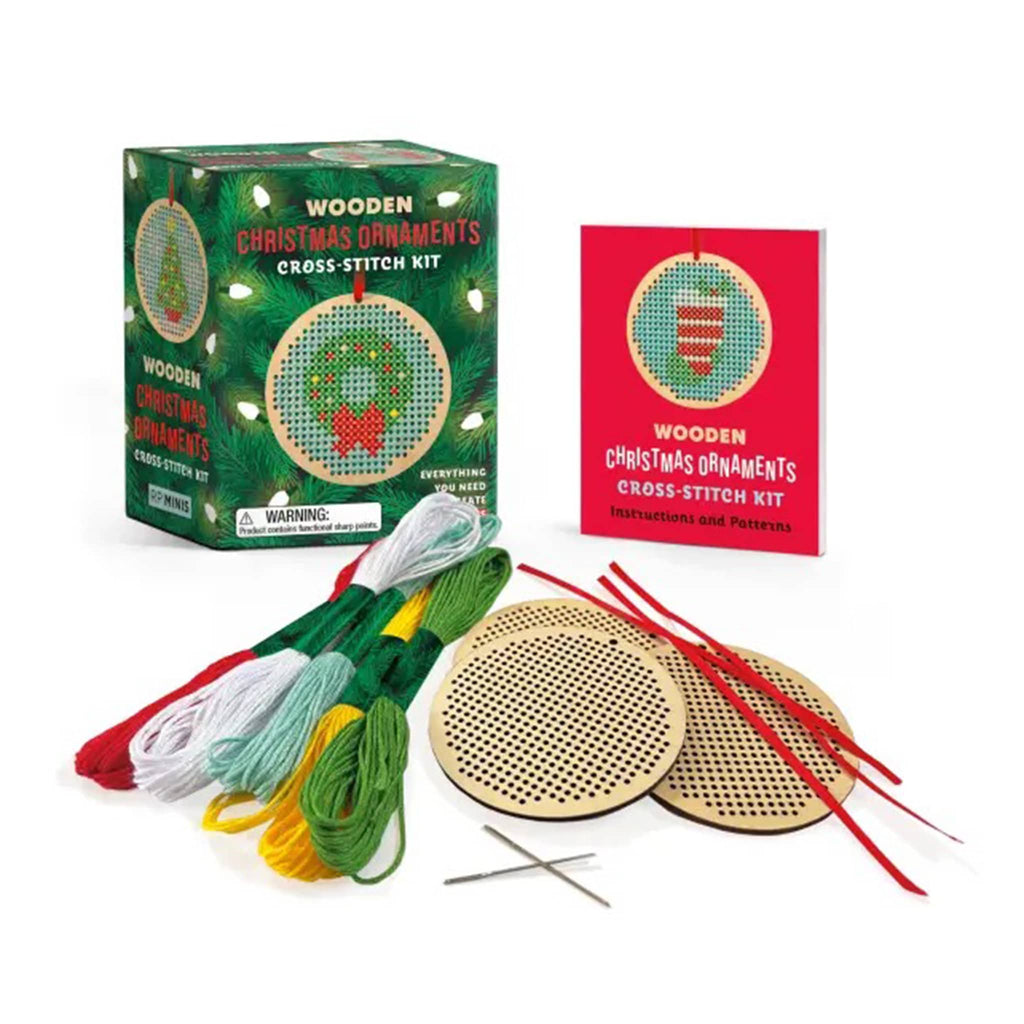 Wooden Christmas ornaments mini cross-stitch kit with packaging and contents on a white background.