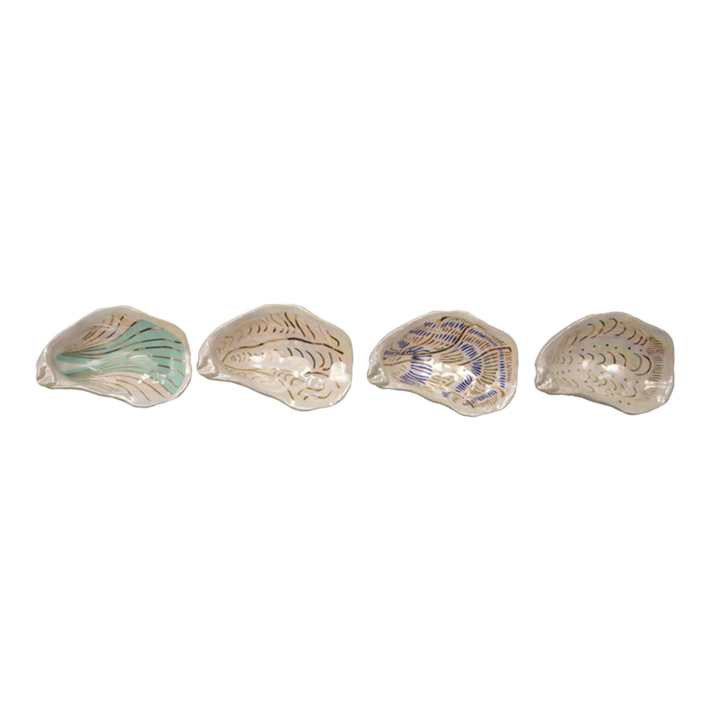Hazel Mazel ceramic oyster dish with gold electroplating details in 4 styles, overhead view.