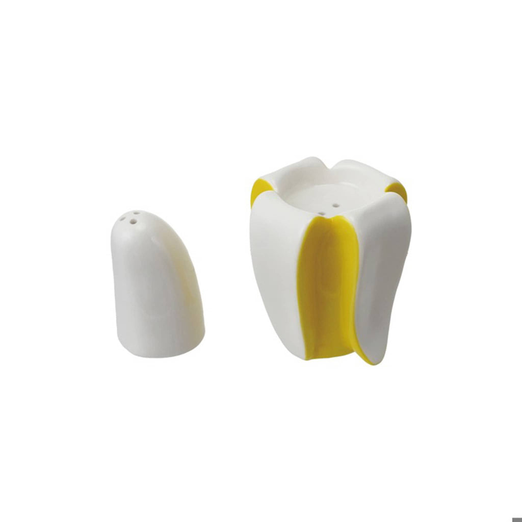 White and yellow banana-shaped salt and pepper shakers separated on a white background.