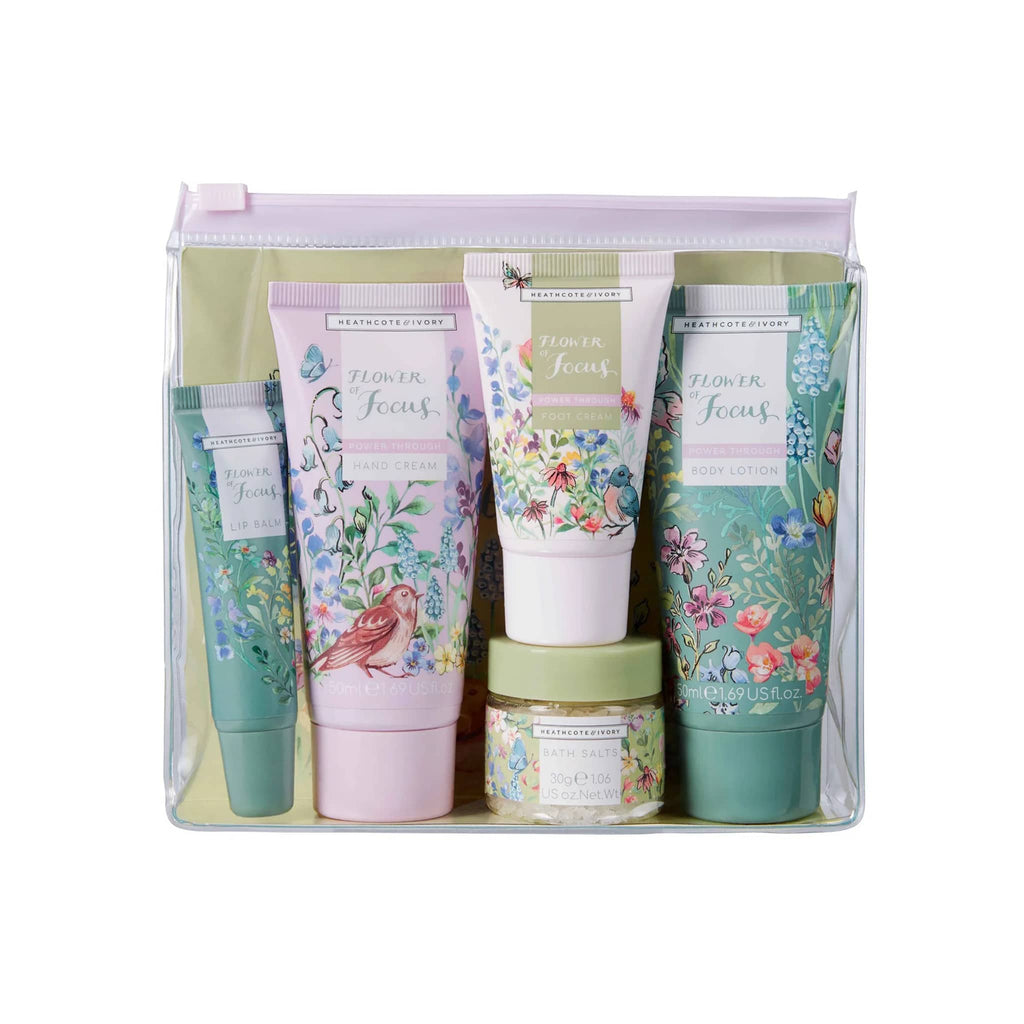 Heathcote & Ivory Flower of Focus Power Through Top to Toe Kit in clear reusable pouch packaging, front view.