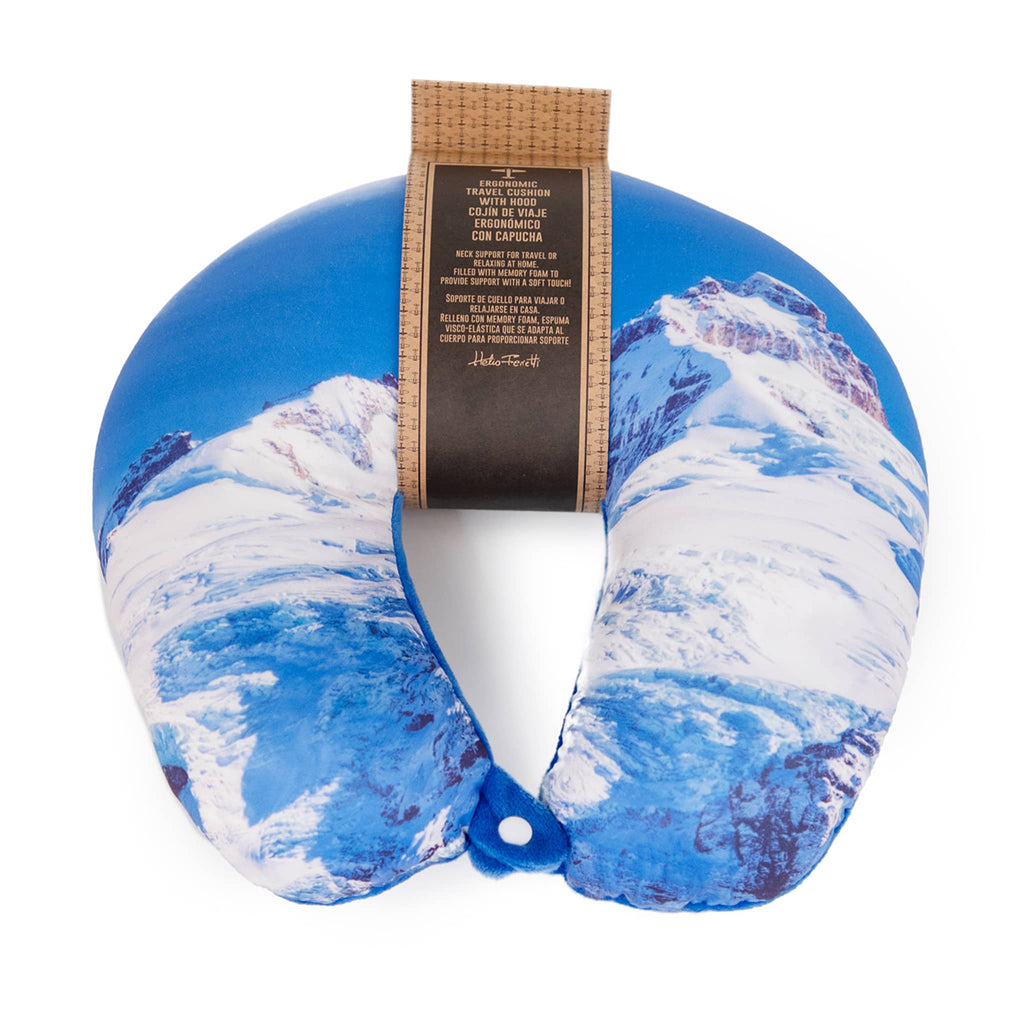 Travel neck pillow with snowy mountain design and a label on a white background.