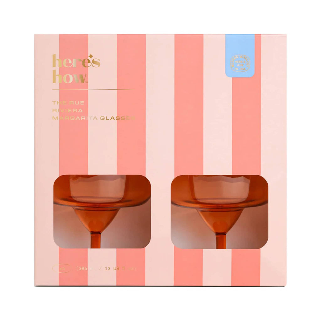 Here's How The Rue Riviera Margarita Glasses in orange, set of four in melon striped box packaging, front view.