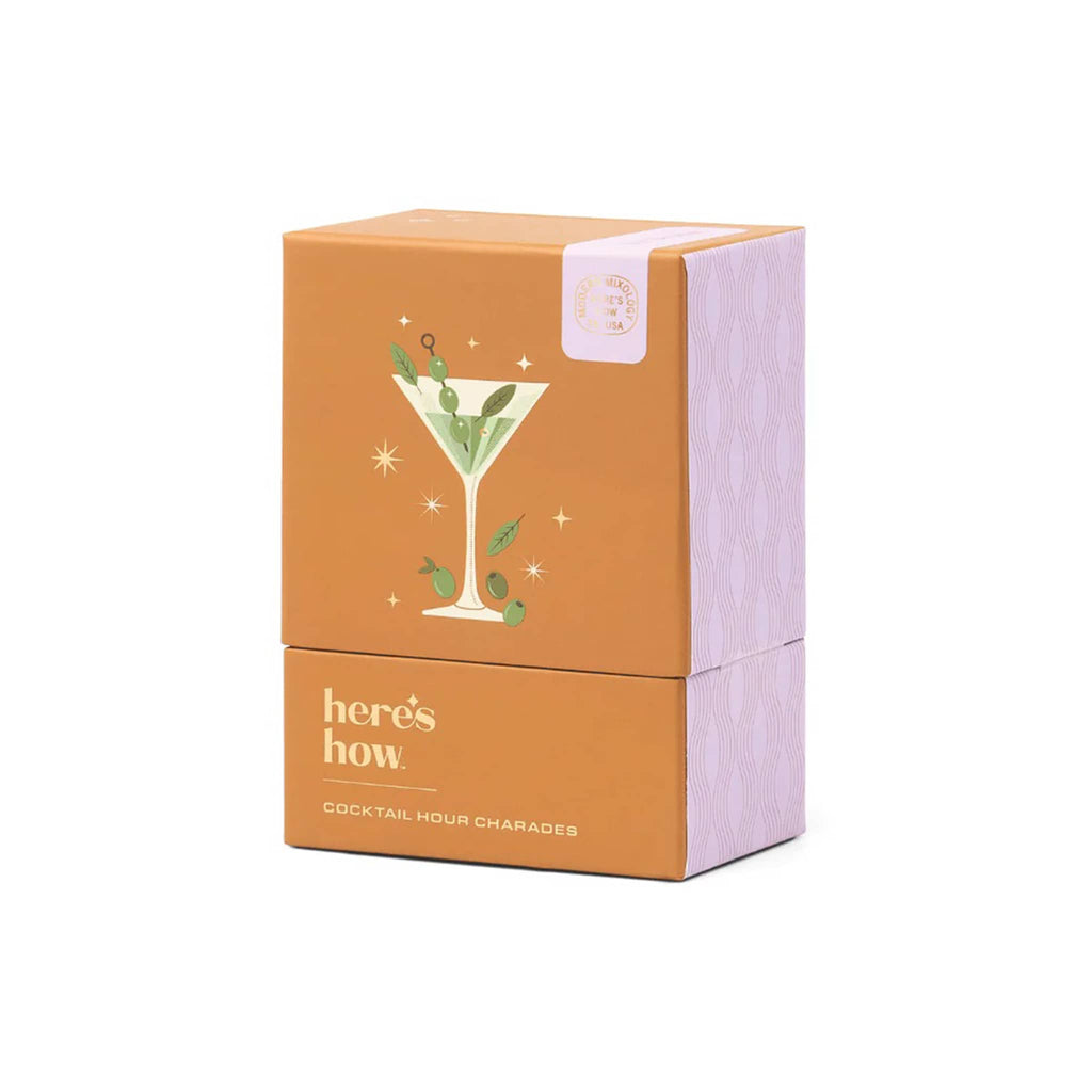 Cocktail Hour Charades game in orange and pink box with cocktail illustration and 'here's how' branding, on a white background.