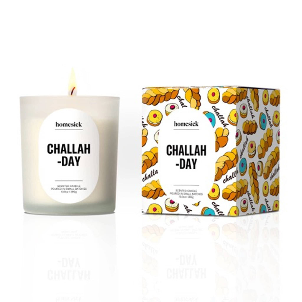 Homesick Challah-Day candle and illustrated box packaging on a white background.