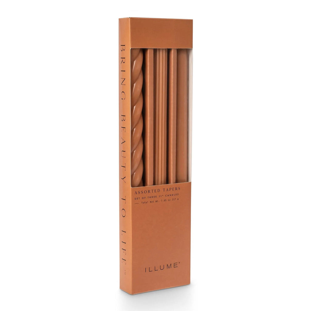 Illume Terracotta Burnt Orange Set of 3 taper candles in assorted textures in box packaging, front view.
