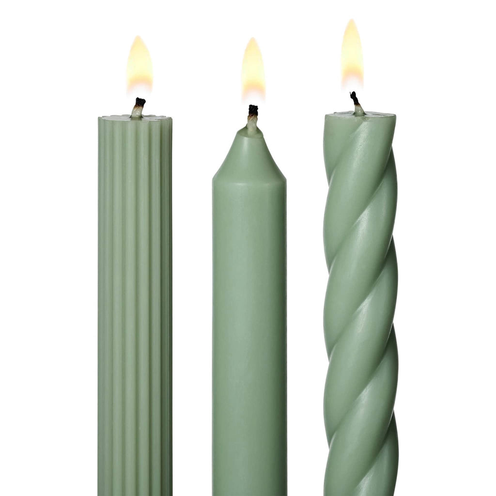 Illume Mint Green Set of 3 taper candles in assorted textures, detail of lit wicks.