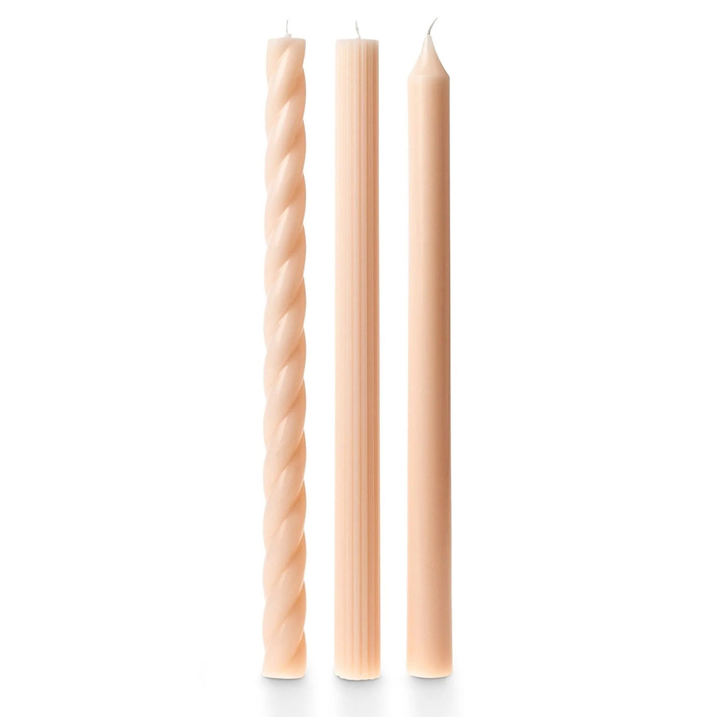 Illume Pale Blush Pink Set of 3 taper candles in assorted textures.