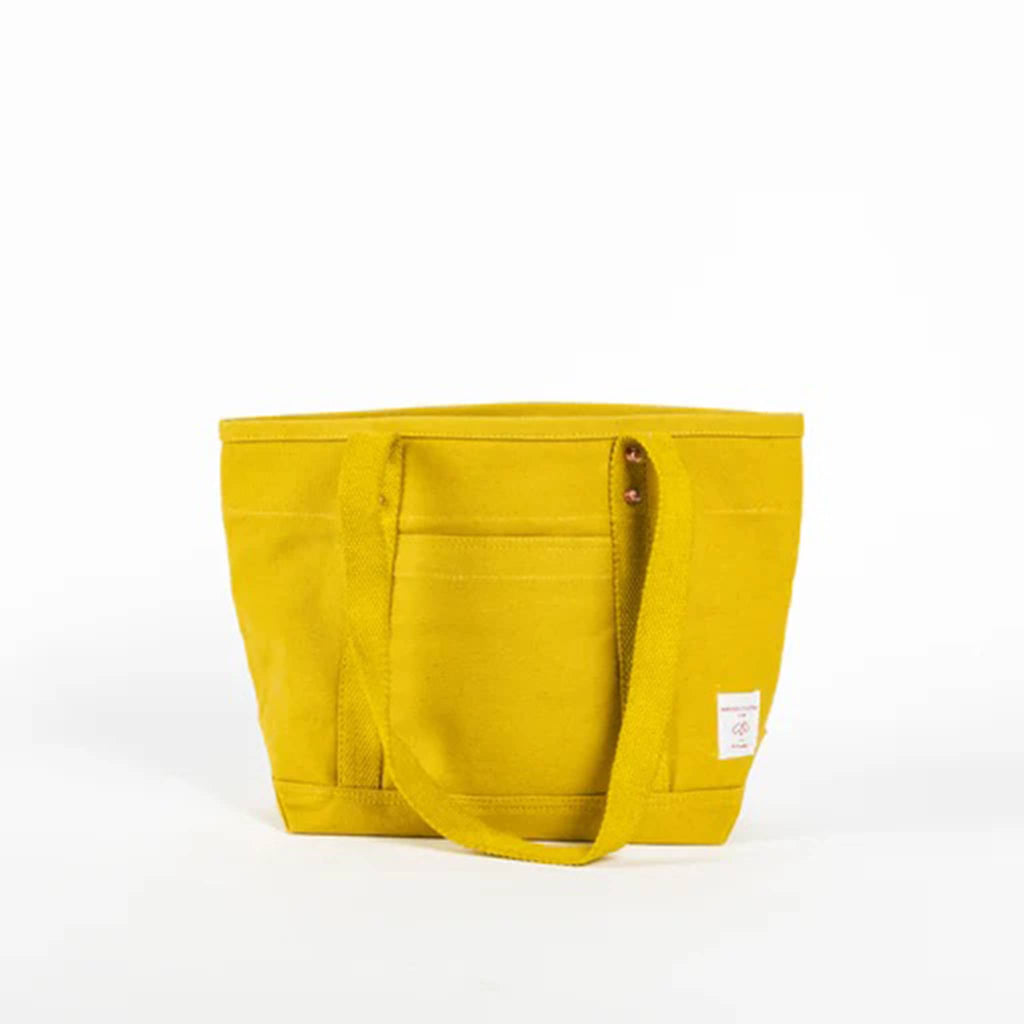 Chartreuse canvas tote bag with shoulder straps, front view, on a white background.