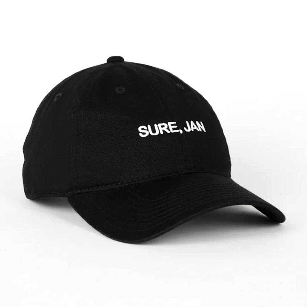 Black cap with 'SURE, JAN' text on a white background.
