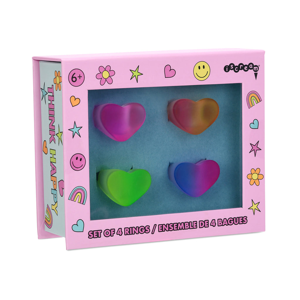iScream set of 4 ombre colored acrylic heart-shaped rings in pink illustrated box, front angle view.