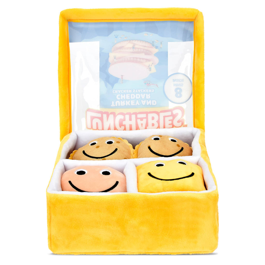 Lunchables Turkey and Cheddar packaging plush toy, open to show mini plush crackers, turkey slice and cheese on a white background.