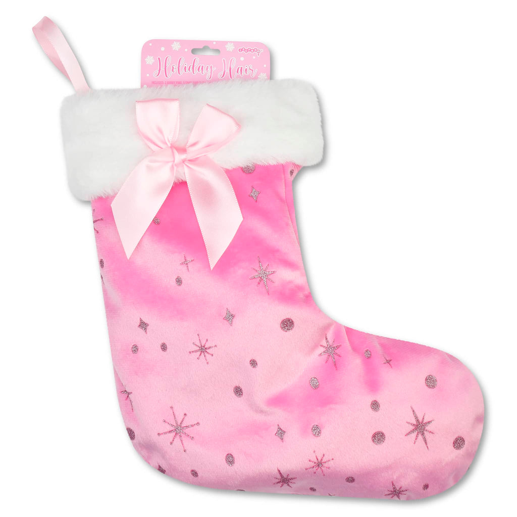Pink Christmas stocking with glittery snowflake pattern on a white background.