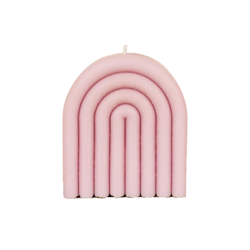 JaxKelly blush pink short hand-molded arch unscented soy wax candle, front view.