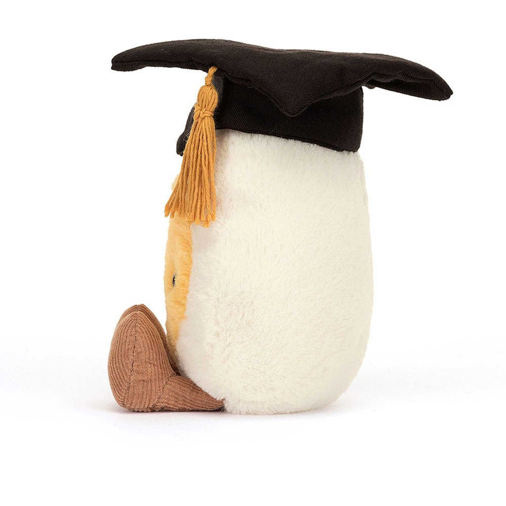 jellycat amuseables boiled egg with graduation cap, side view.