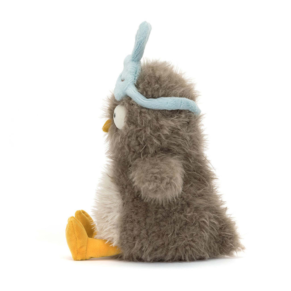 Jellycat Audrey Hootsoftly owl with bunny eye mask plush toy, side view.