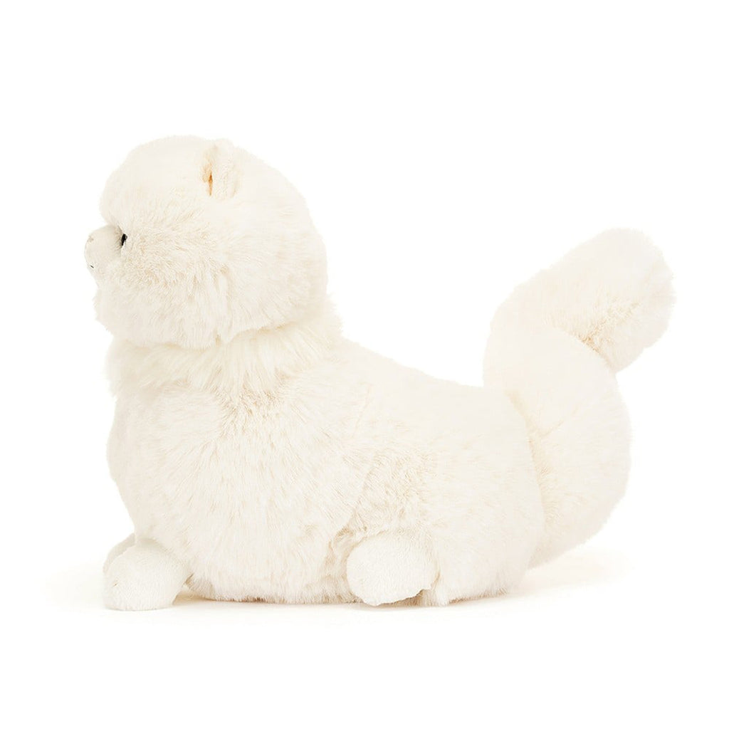 Jellycat Carissa Persian Cat plush toy with fluffy white fur, black bead eyes and a stitched nose, side view.