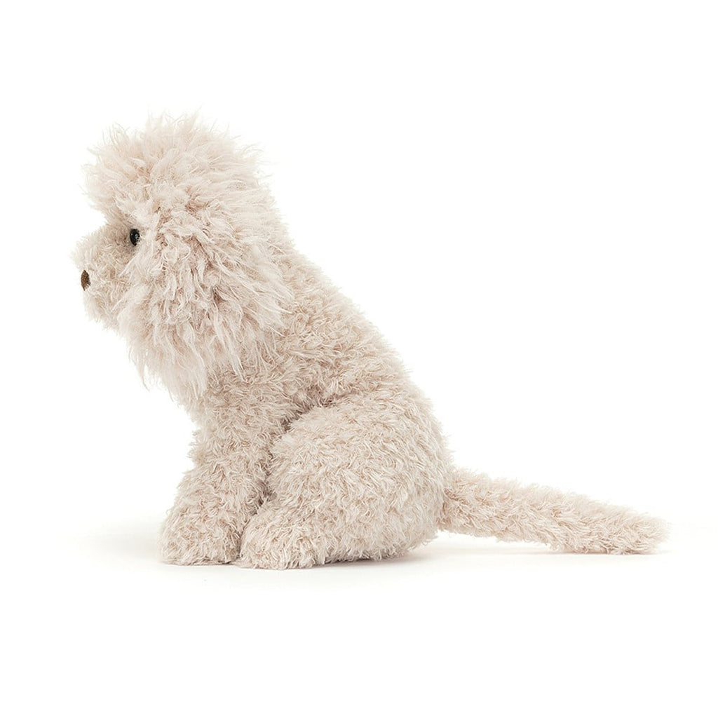 Jellycat Georgiana Poodle Plush Toy with cream fur, brown nose and black bead eyes, side view.