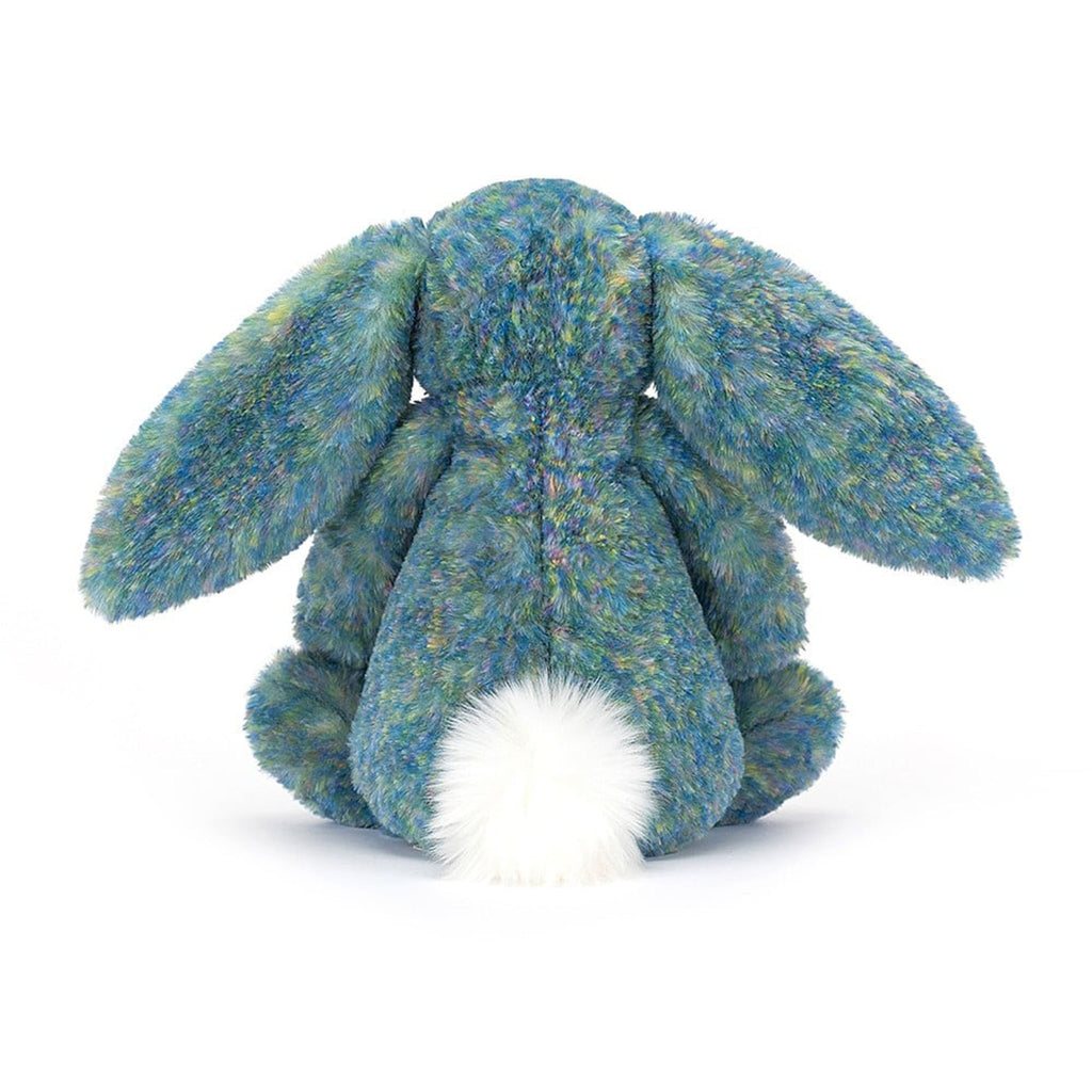 Jellycat Medium Bashful Luxe Bunny Azure plush toy in sitting position with white tail and colorful blue and green fur, back view.