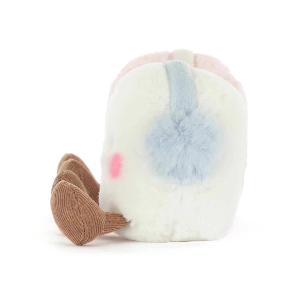 A pink and a white plush marshmallow with earmuffs, side view on a white background.