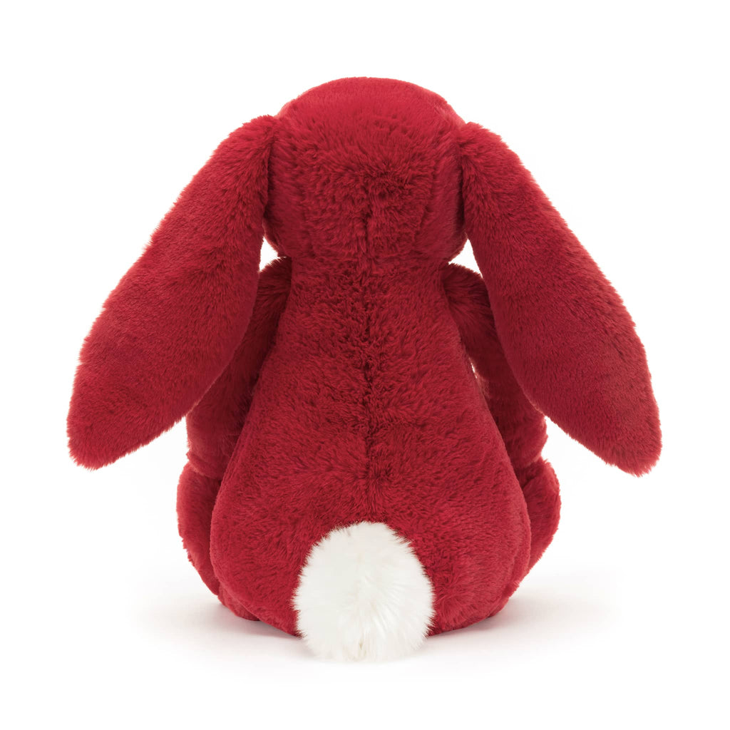 Large red plush bunny toy with floppy ears, back view, on a white background.