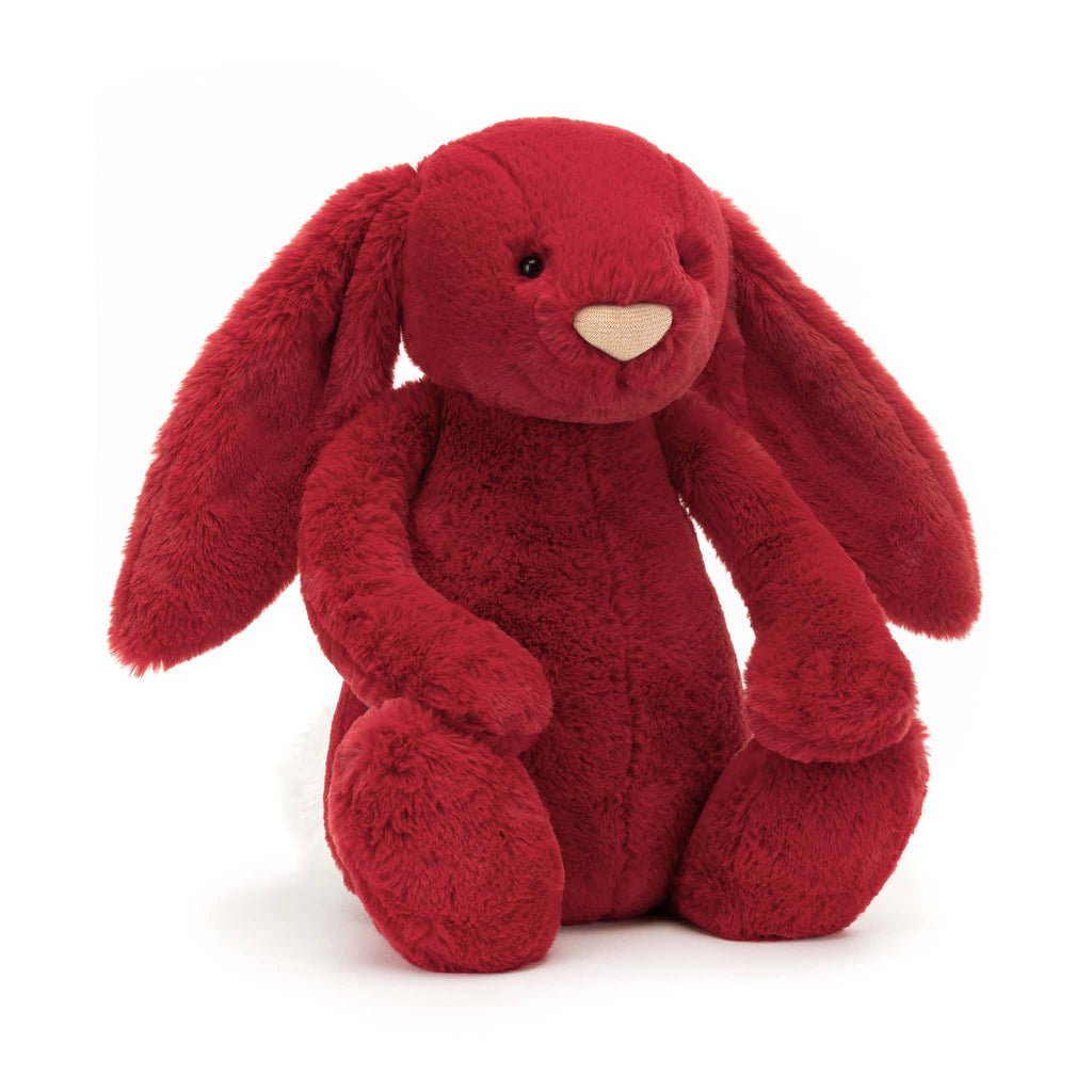 Large red plush bunny toy with floppy ears, front angle view, on a white background.