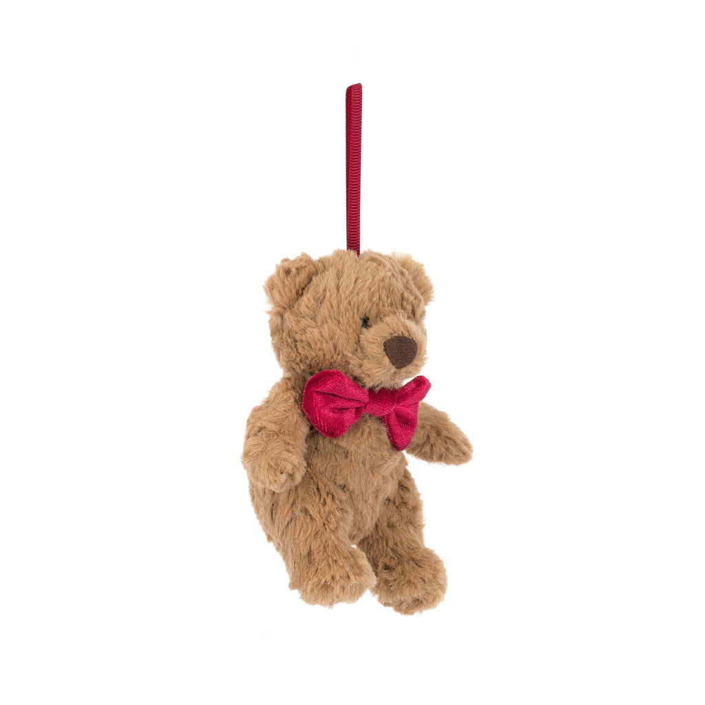 Plush teddy bear ornament with a red bow tie, front angle view, on a white background.