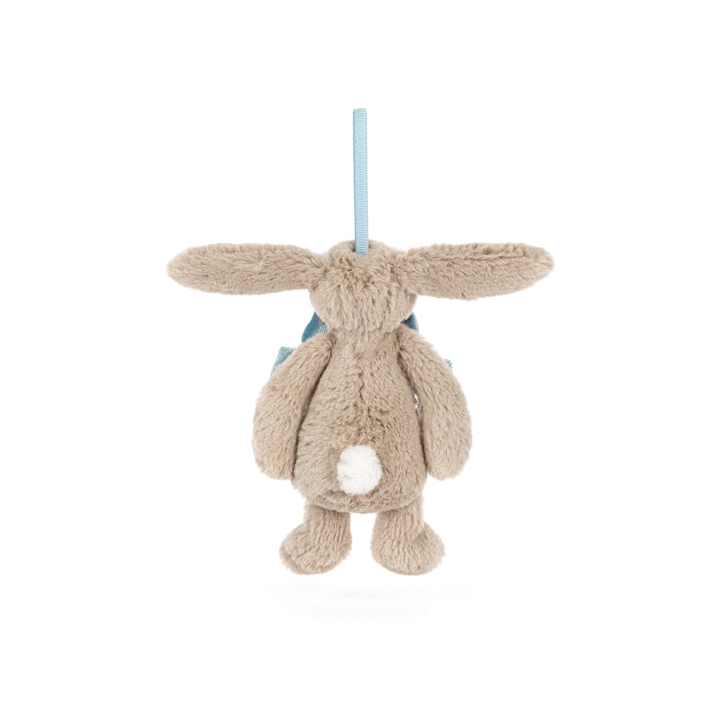 Plush beige bunny ornament with a blue bow tie, back view, on a white background.