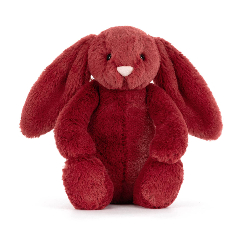 Red plush bunny toy, front view, on a white background.