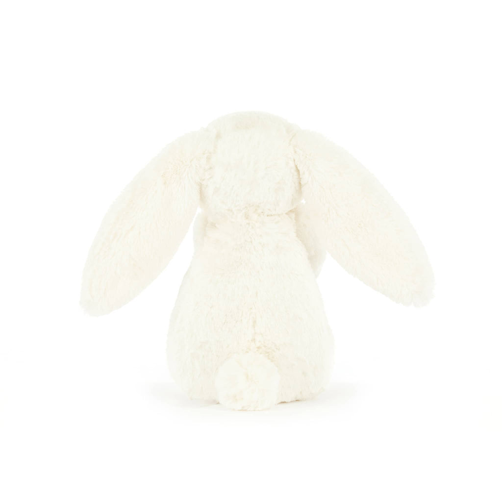 Jellycat Bashful Bunny with pink peony, back view.