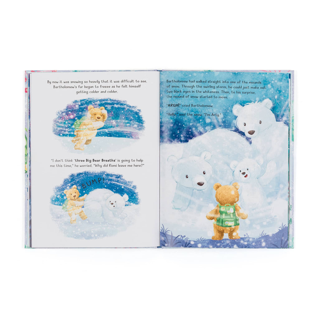 Open book showing illustrations of teddy bears in a snowy scene.