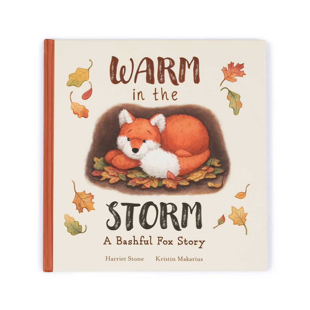 Children's book titled 'Warm in the Storm' with a fox illustration on the cover.