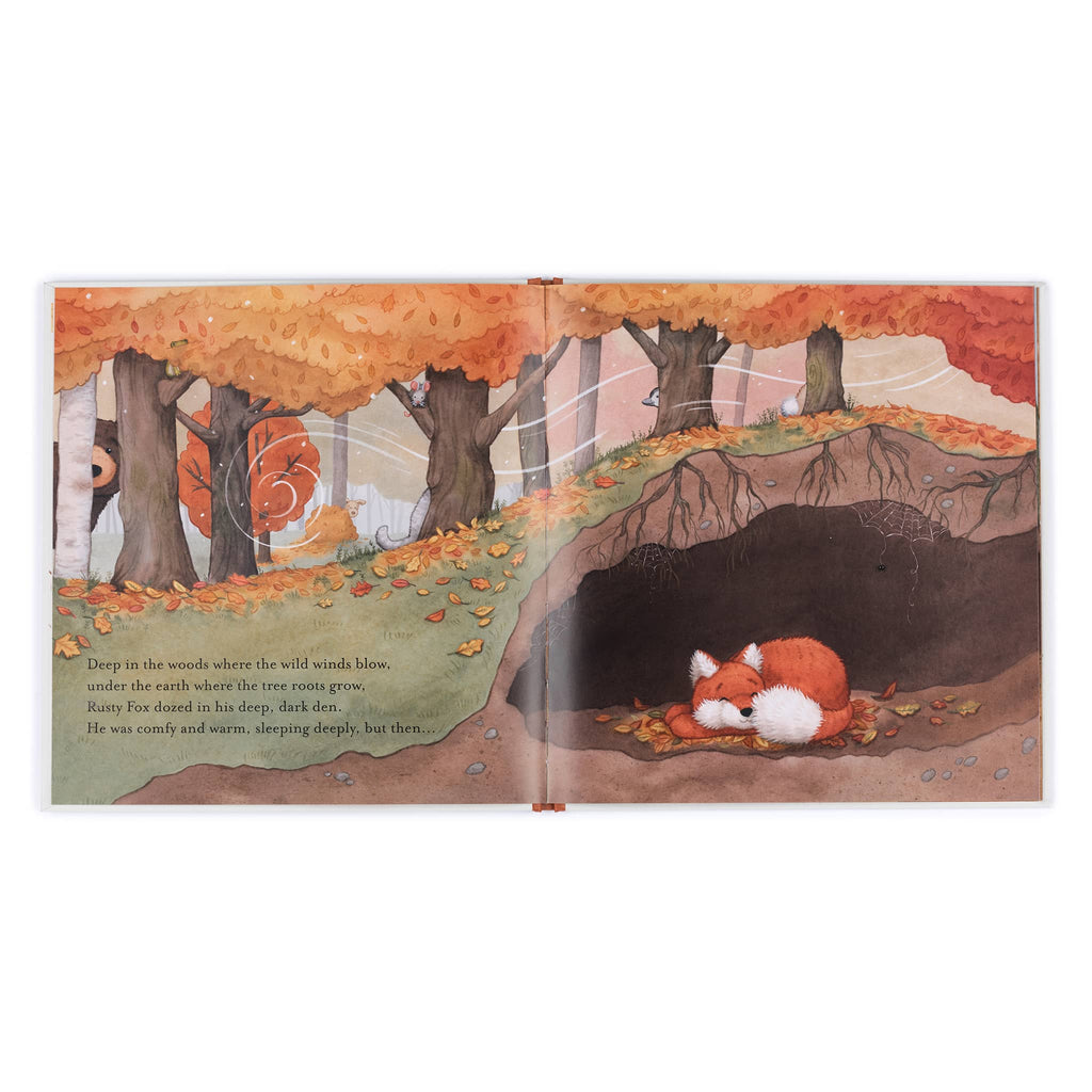 Illustrated book page with a fox in a forest during autumn.