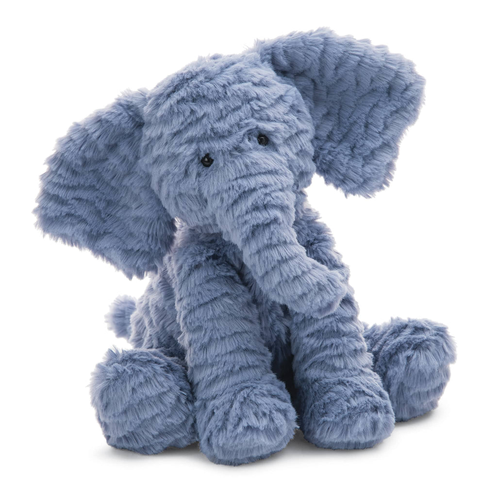 Blue/gray plush elephant toy on a white background.