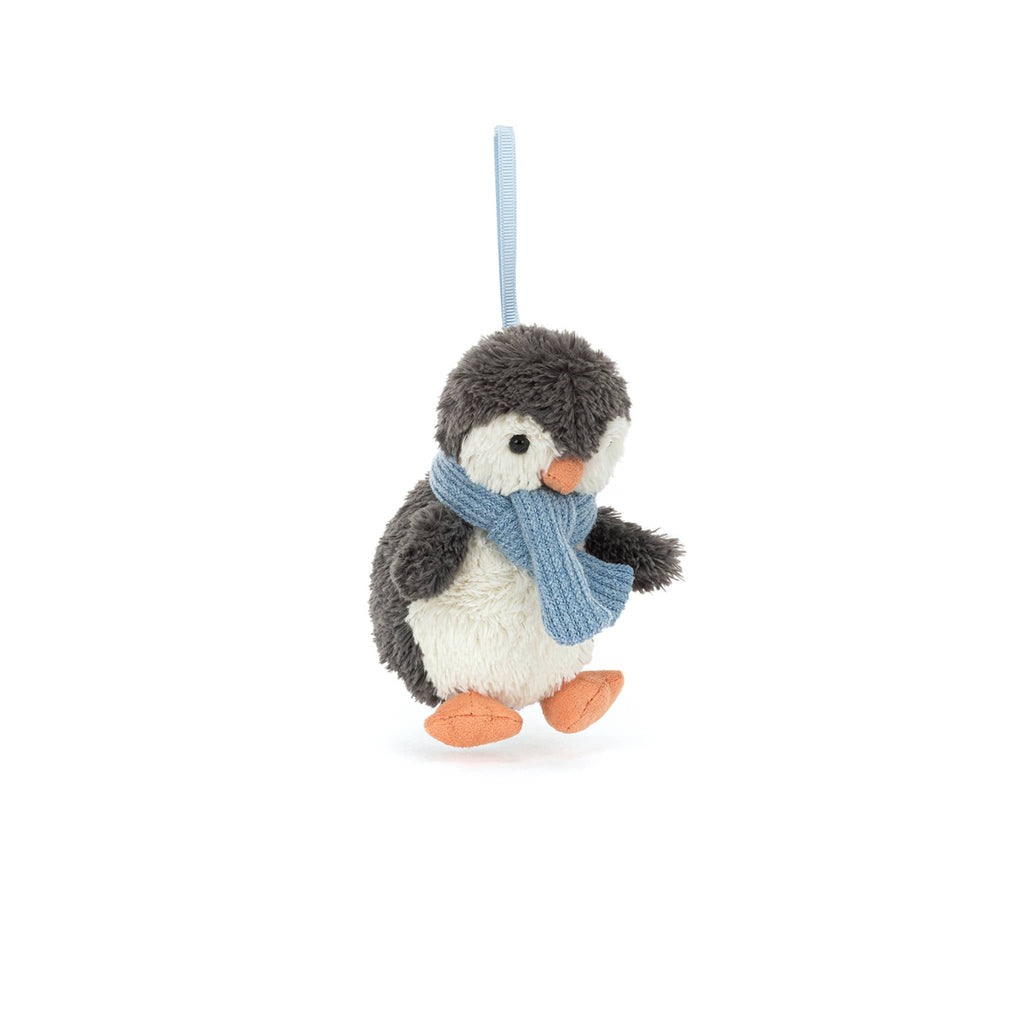 Plush penguin ornament with a blue scarf, front angle view, hanging, on a white background.