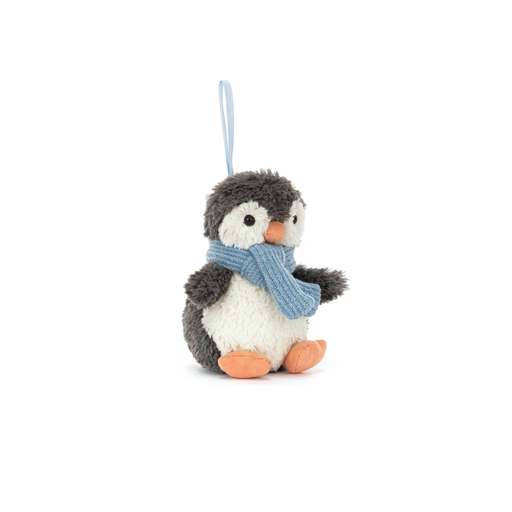 Plush penguin ornament with a blue scarf, front angle view, on a white background.