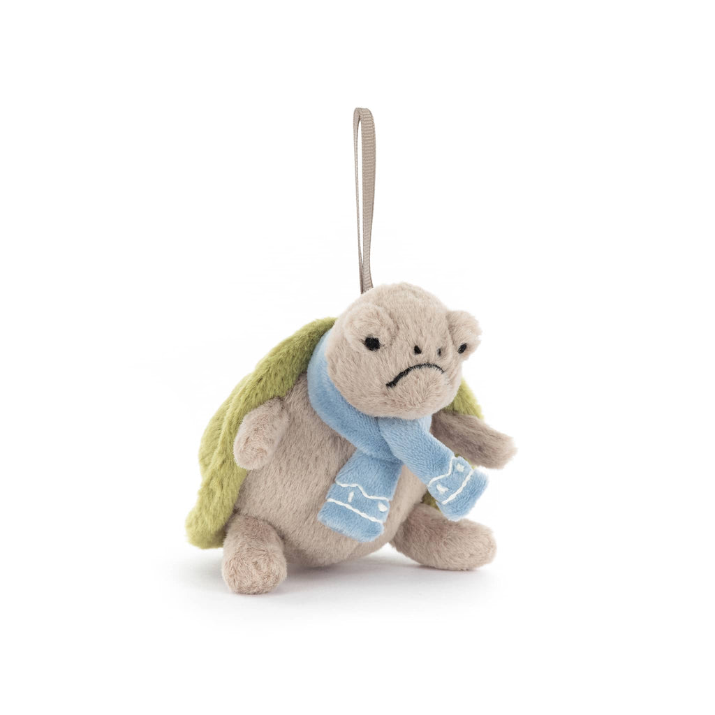 Plush turtle ornament with a blue scarf, front angle view, on a white background.