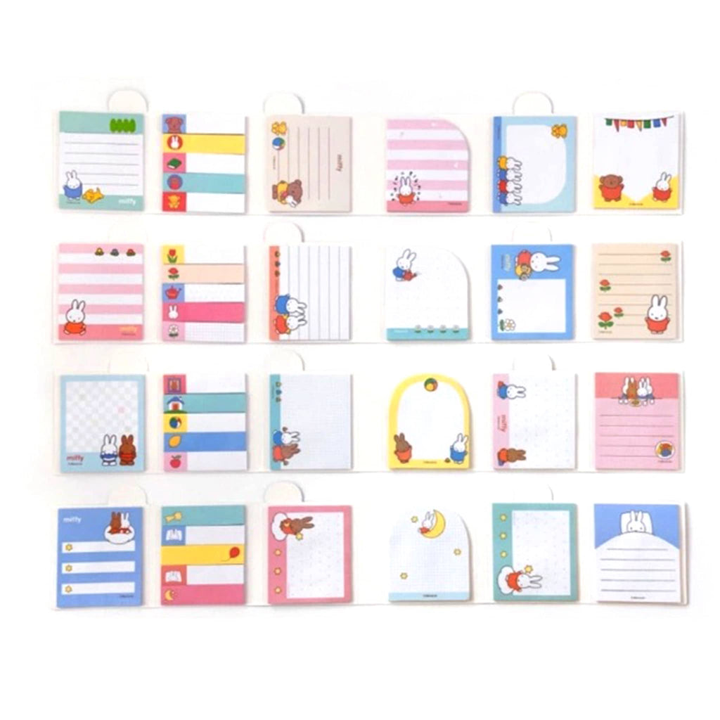 Set of colorful stationery items with cartoon designs on a white background.