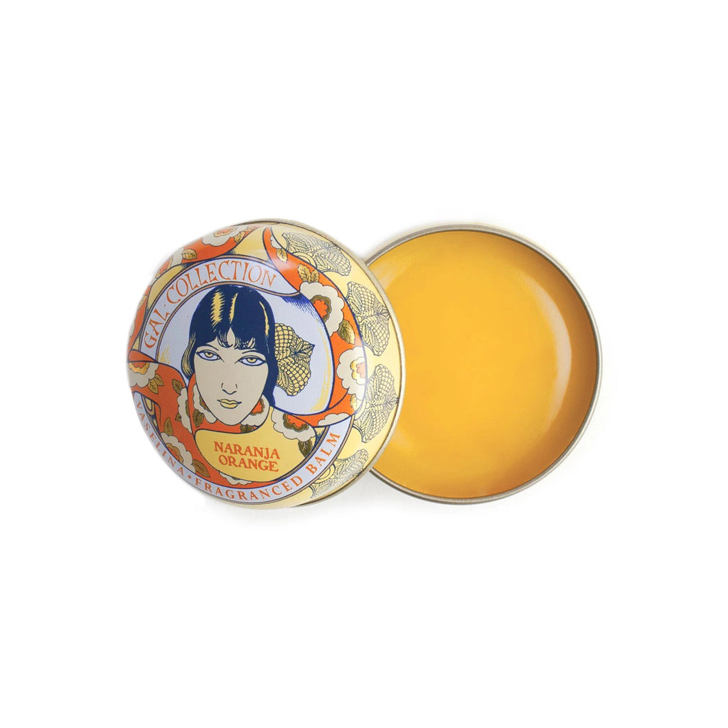 Kala Style Perfumeria Gal orange fragranced lip balm in a yellow and orange vintage-inspired illustrated tin.